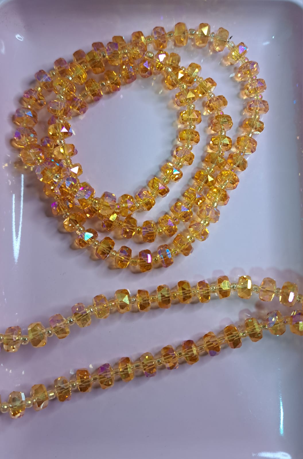 CRISTAL RONDELL FACETADO CON MOSTACILLA | NARANJA TRASLUCIDO TORNASOL | 5.1MM
