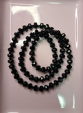 CRISTAL RONDELL FACETADO CON MOSTACILLA | NEGRO MATTE | 5.1MM