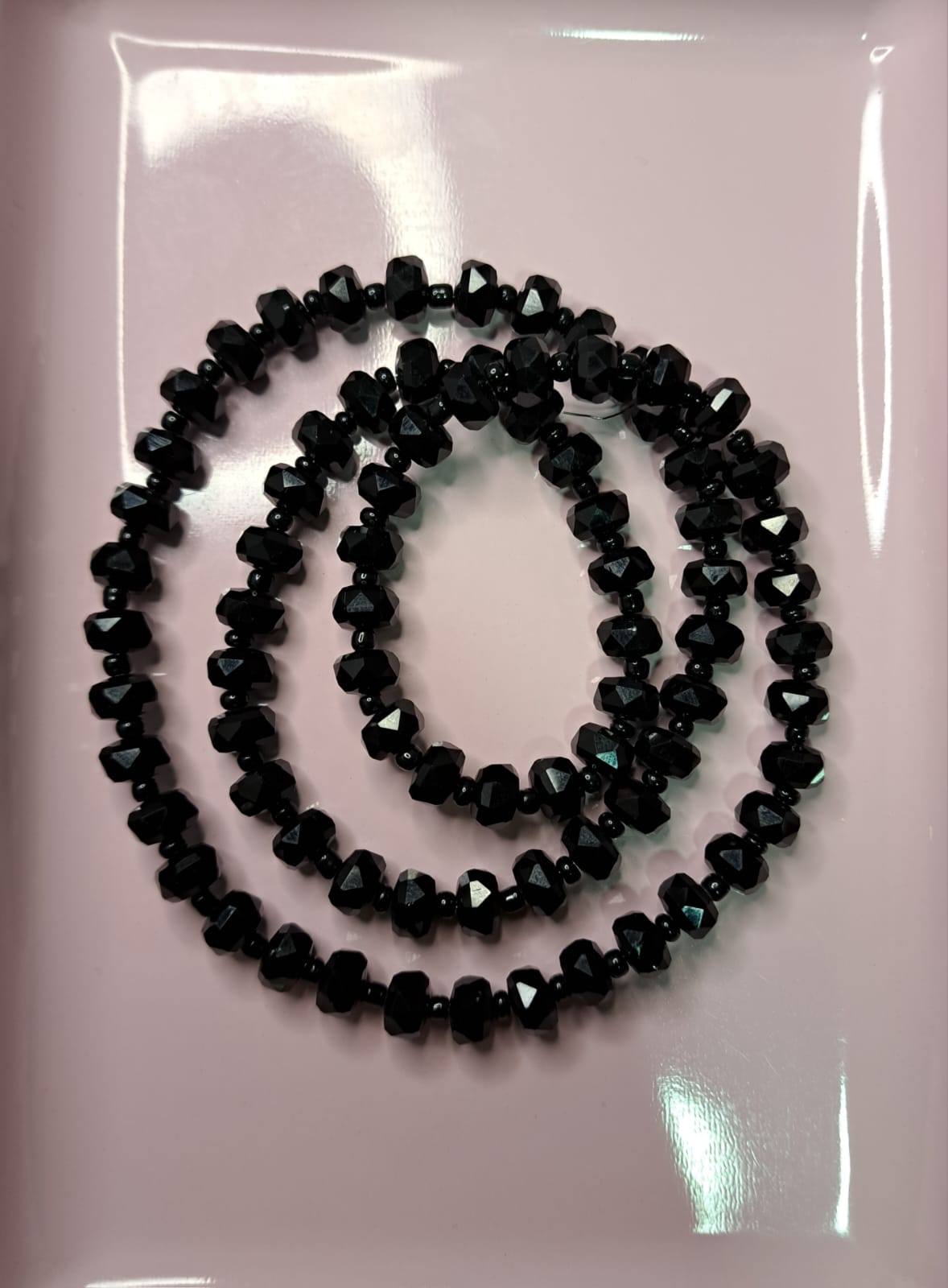 CRISTAL RONDELL FACETADO CON MOSTACILLA | NEGRO MATTE | 5.1MM