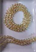 CRISTAL RONDELL FACETADO CON MOSTACILLA | AMBAR TRALUCIDO | 5.1MM