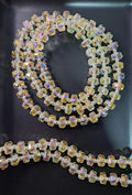 CRISTAL RONDELL FACETADO CON MOSTACILLA | AMARILLO CLARO TRASLUCIDO TORNASOL | 5.1MM