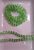CRISTAL RONDELL FACETADO CON MOSTACILLA | VERDE TRASLÚCIDO| 5.1MM