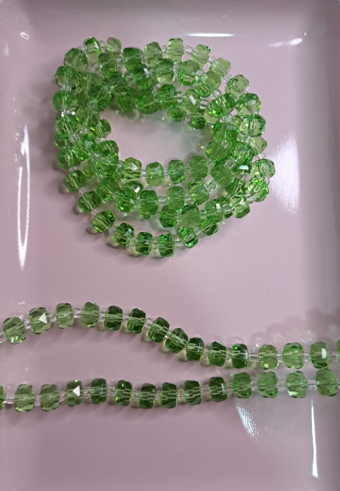 CRISTAL RONDELL FACETADO CON MOSTACILLA | VERDE TRASLÚCIDO| 5.1MM
